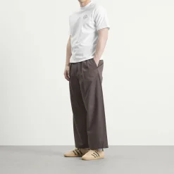 NOMARHYTHM TEXTILE Logo T-Shirt